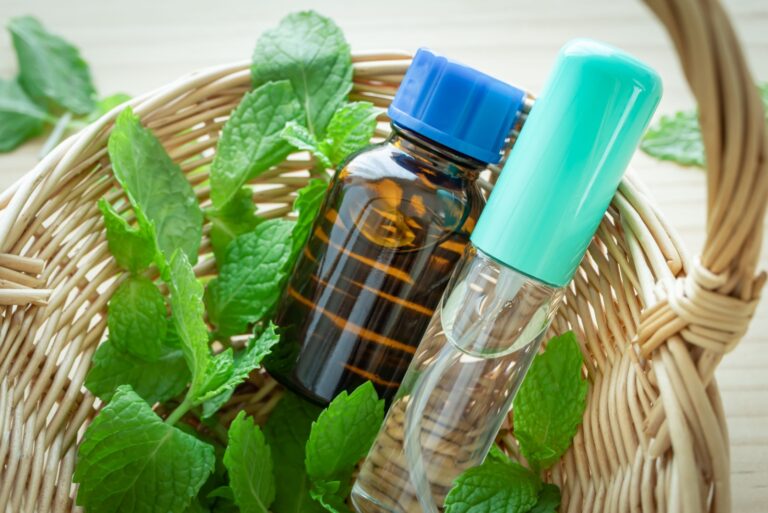 Peppermint oil and mint leaves