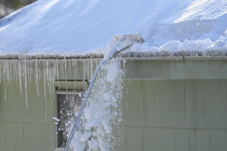 removing snow and icicle on the roof