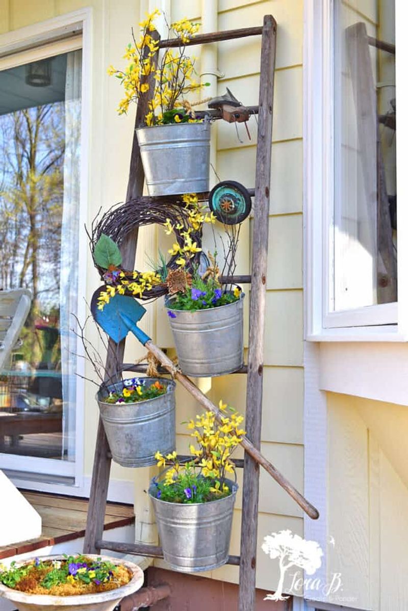 Arranging Plants On Rustic Wooden Crates And Ladders