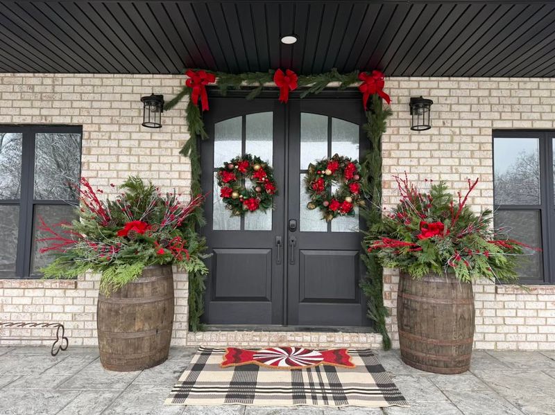 Lanterns Nested In Evergreen Planters