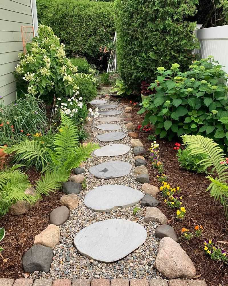 Stone Pathways Wind Through Garden Rooms