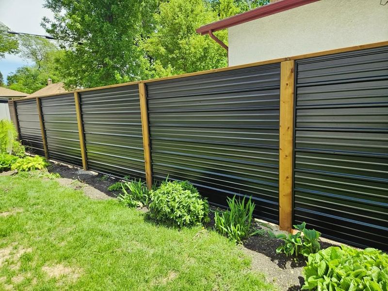 Metal Fencing Replaces Wooden Privacy Barriers