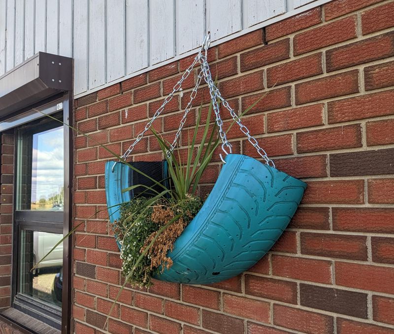 Tire Planters Painted In Cheerful Colors
