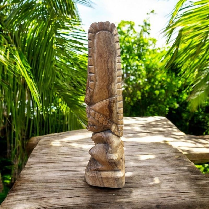 Carved Tiki Statues and Wooden Sculptures