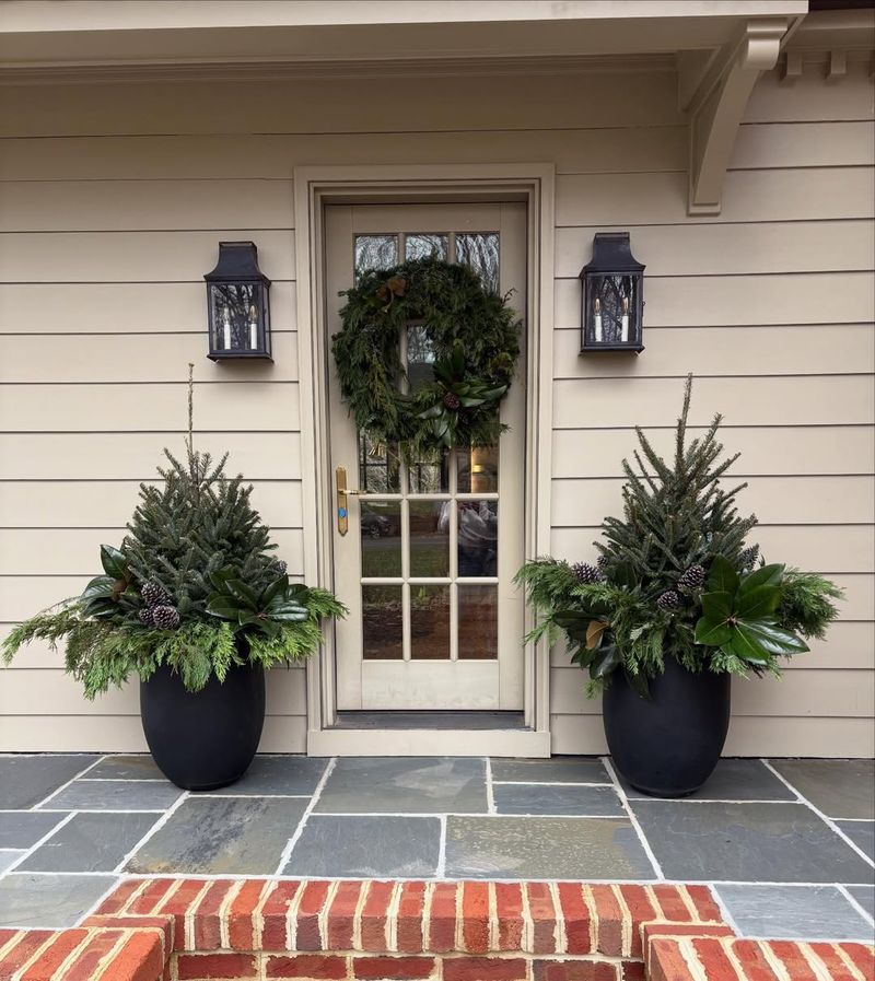 Potted Evergreens Framing The Gate