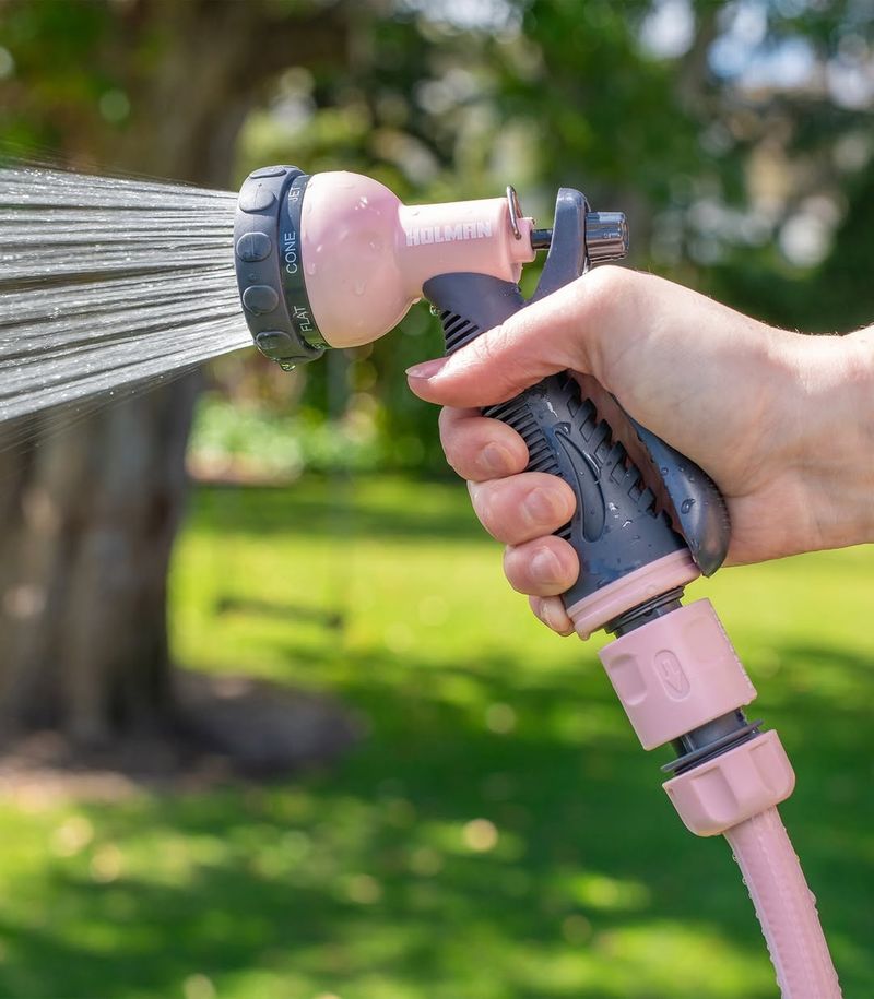 Spray Water From A Hose Or Sprinkler