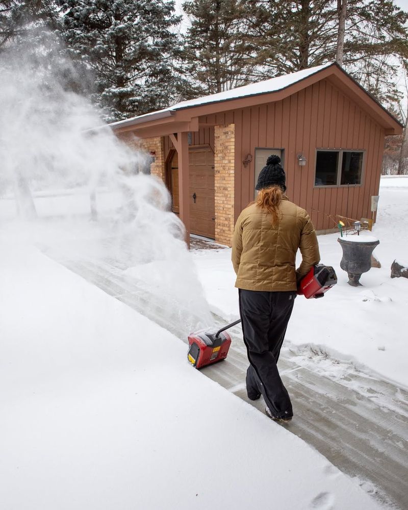 Scraping Snow Removal Tools Across Lawn Surfaces