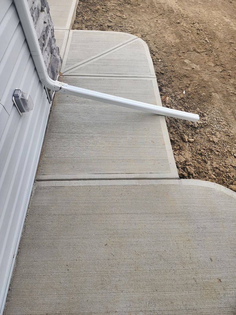 Redirect Downspouts To Stop Backyard Flooding