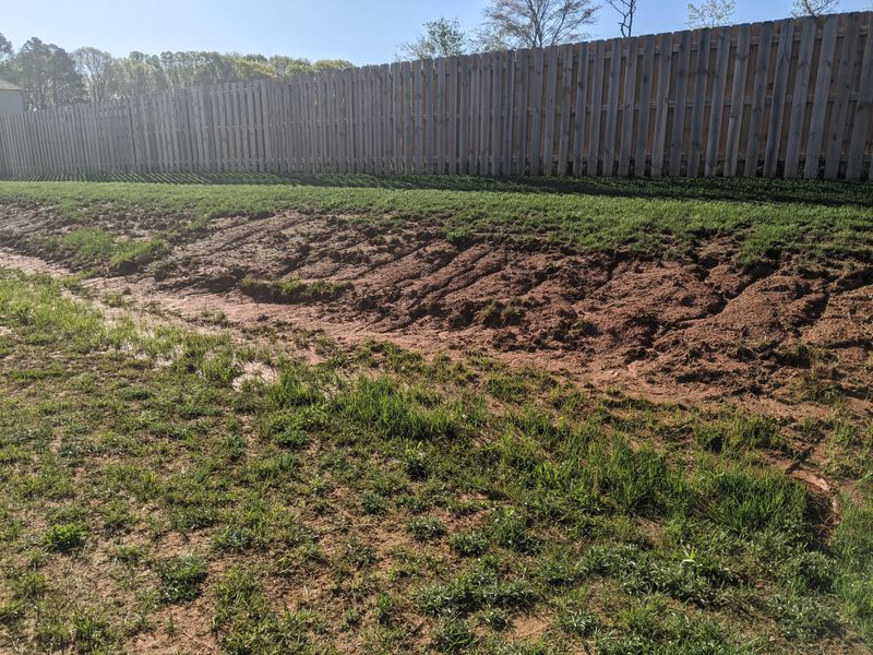 Erosion Washing Away Topsoil And Mulch