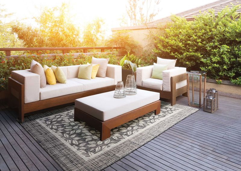 Install An Outdoor Rug To Add Warmth And Define Spaces