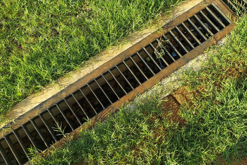Maintain Gutters And Drains To Prevent Overflow