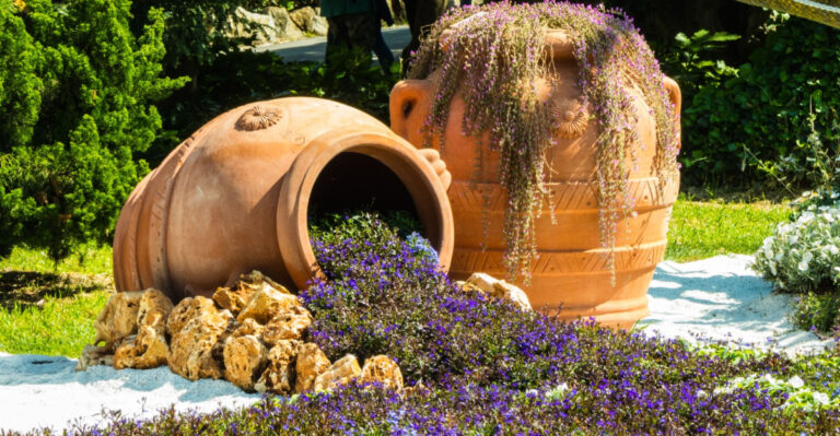 Pottery jars with flowers inside