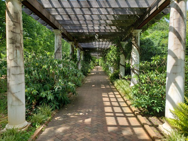 Walk Peaceful Garden Paths Surrounded By Nature