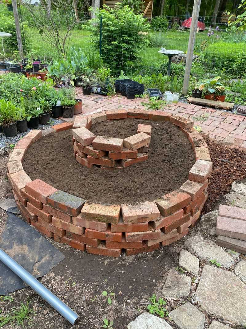 A Herb Spiral Is A Space Saving Vertical Garden Design