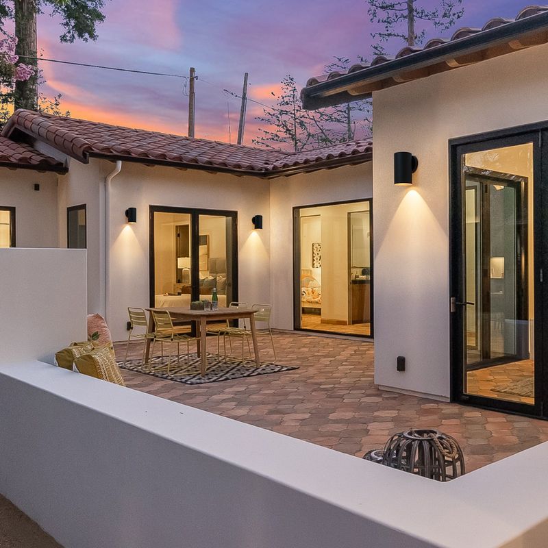 Wall Wash Lighting Softens Stucco And Stone At Night