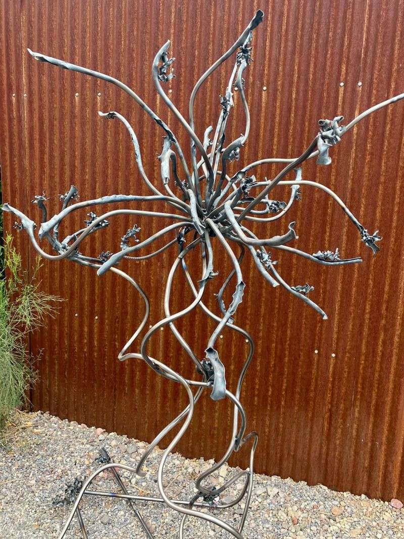 Bring In Sculptural Metal Or Glazed Ceramic Pieces That Reflect Arizona Light