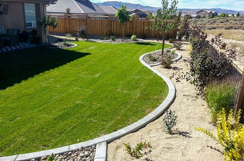 Gravel Mowing Strips Help Separate Lawn From Planting Areas
