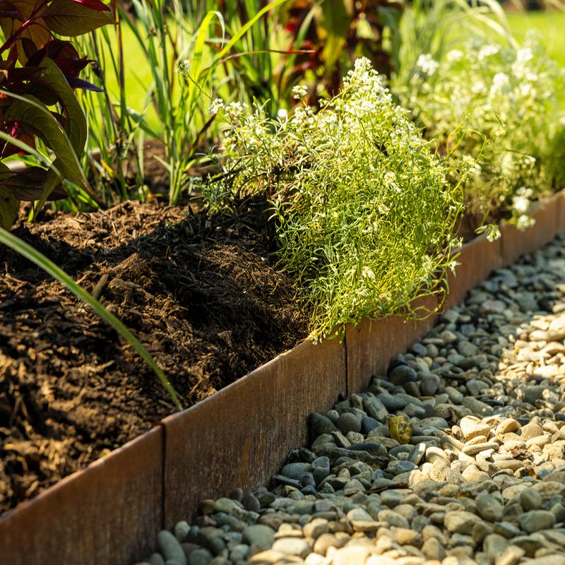Edge Gravel Areas To Keep Grass From Spreading