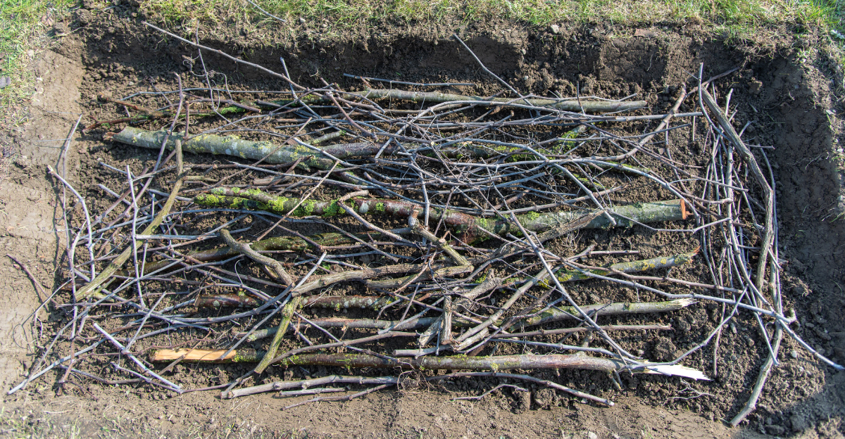 logs in garden bed