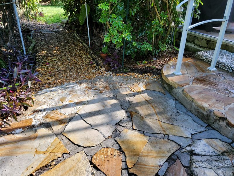 Break Up Plant Beds With Stone, Shell, Or Walkways