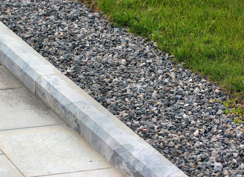 Mulch Or Gravel Barriers Can Help Reduce Tick Movement