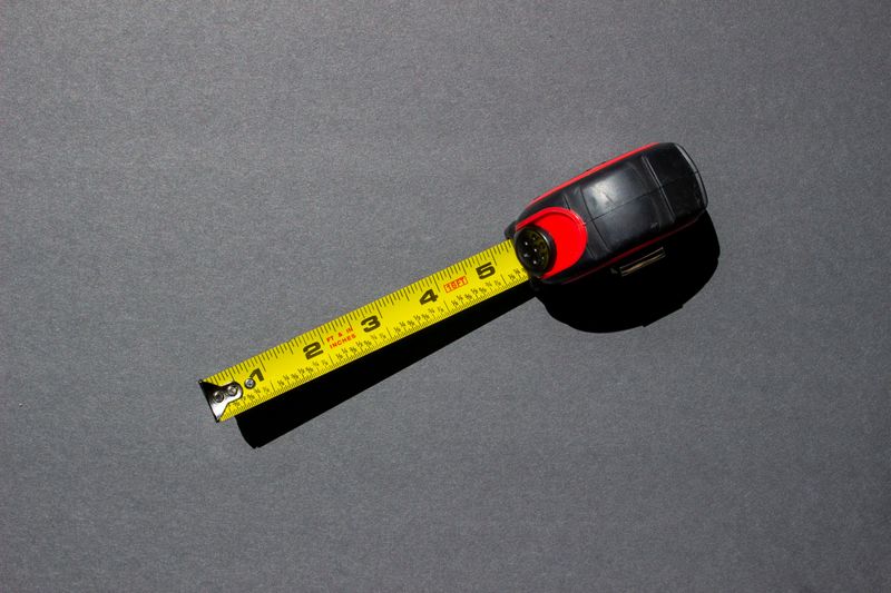 A measuring tape showing 6 inches, the threshold that determines whether a tree removal permit is required in New Jersey.