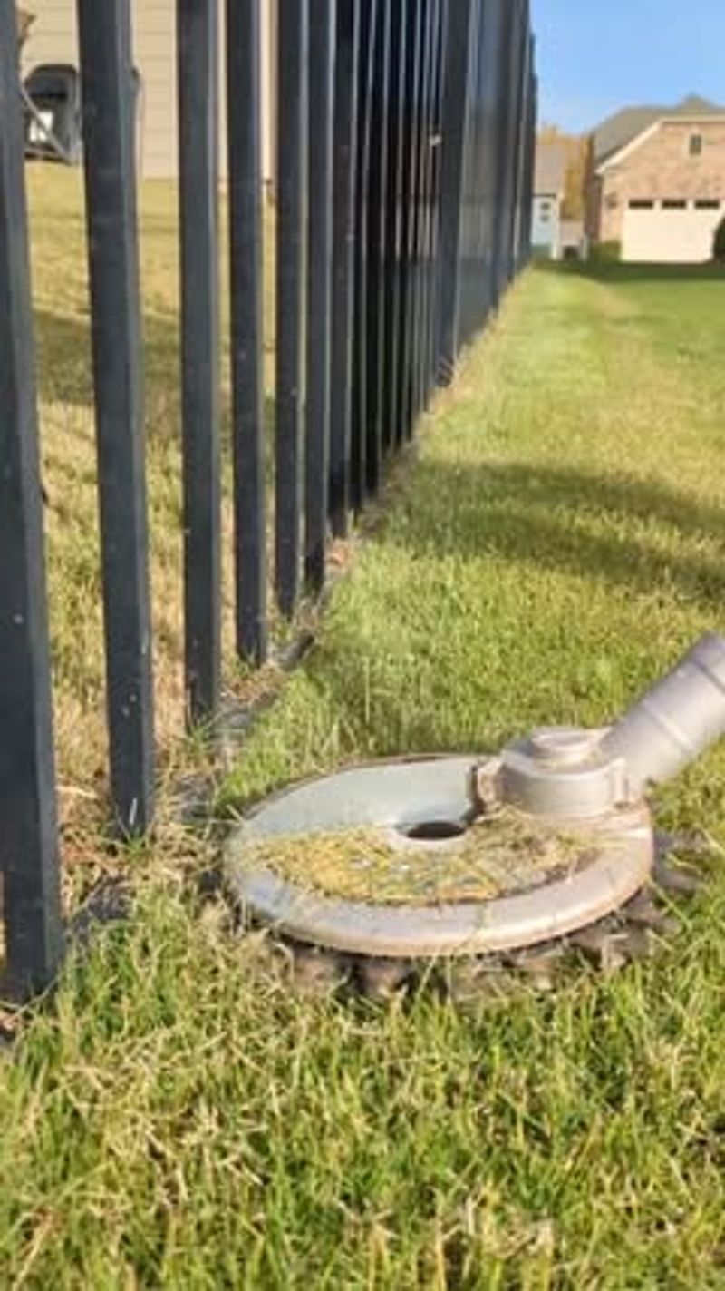Blowing Grass Clippings Into Fence Lines