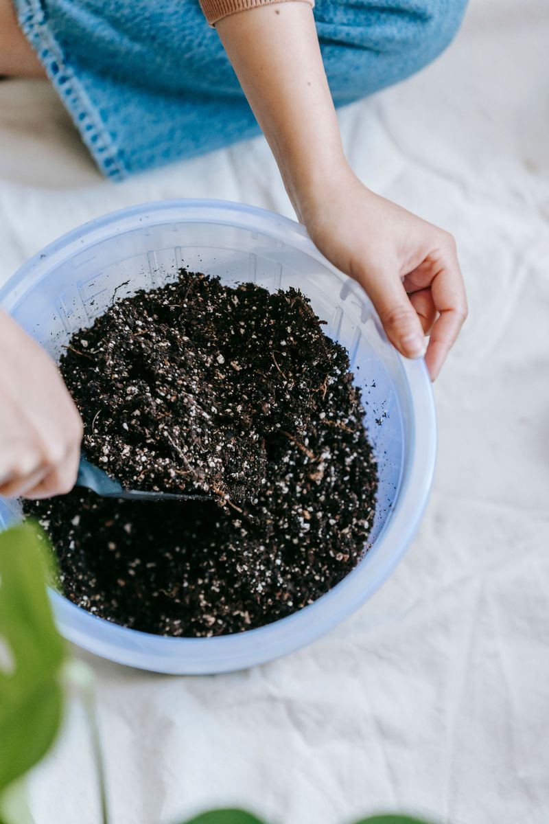 Mixing Water-Retention Crystals Into Potting Mix Mixing Water-Retention Crystals Into Potting Mix