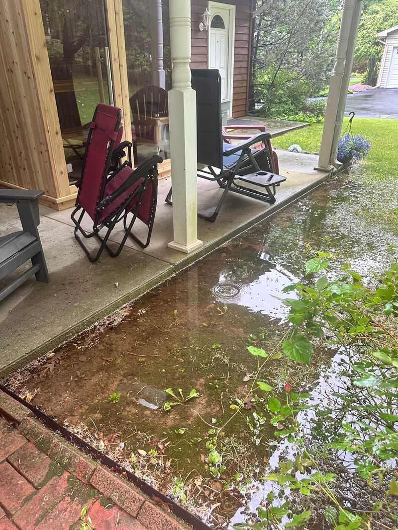 Slopes Send Water Toward The House