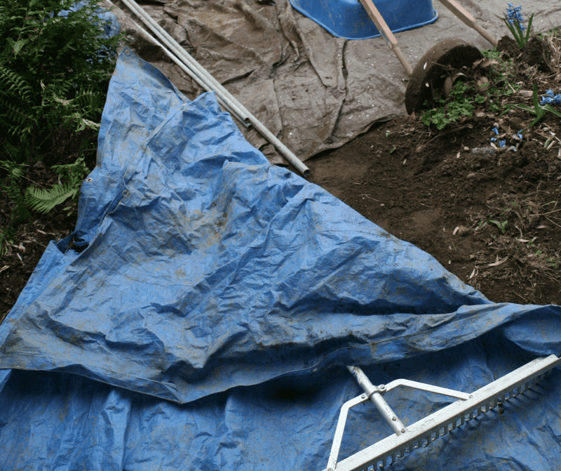 The Tarp Or Plastic Sheeting Over Yard Items The Tarp Or Plastic Sheeting Over Yard Items