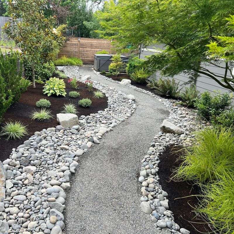 Compacting The Gravel So The Path Stays Put