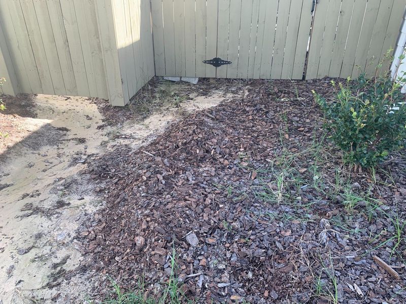 Fine Bark And Shredded Wood Mat Together Under Heavy Rain