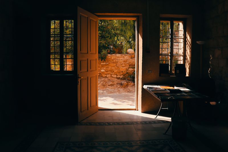 Open Doors Let Outdoor Light Spill Outward