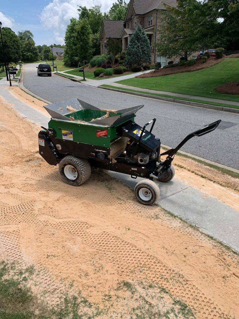 Use A Thin Layer Of Topdressing To Fill Small Dips