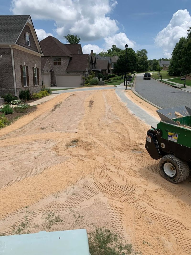 Bumpy Low Spots Get Smoothed With Topdressing