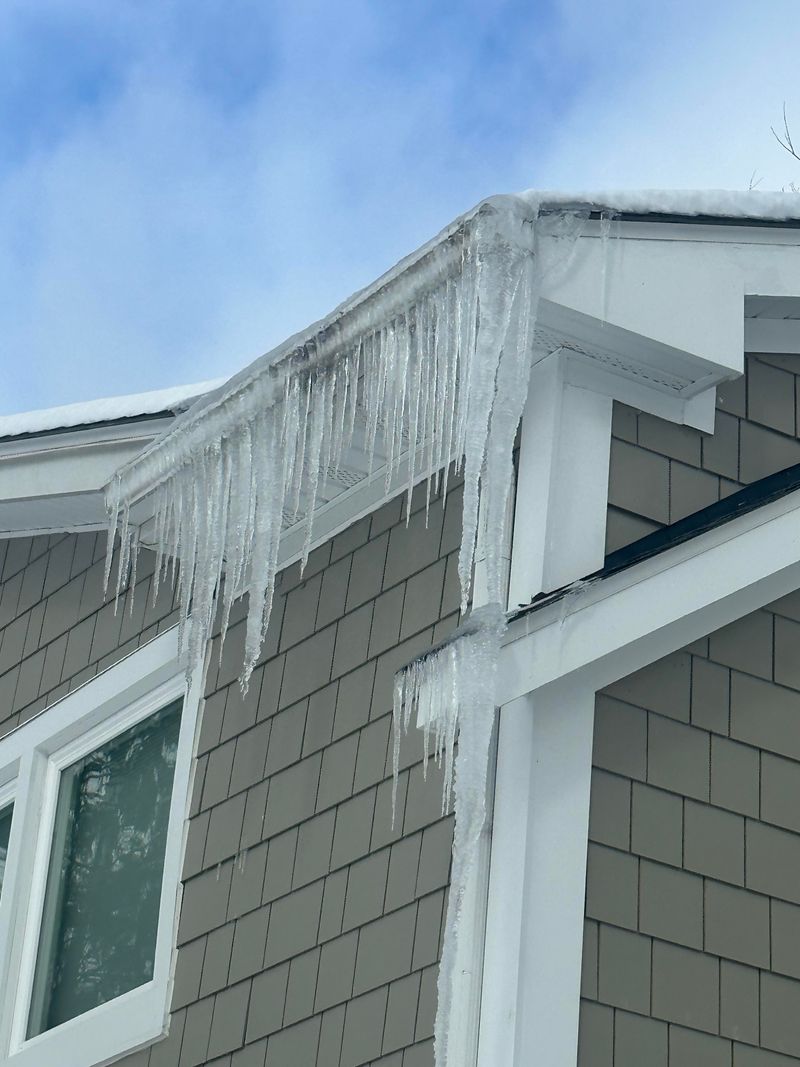 Ice Dams Formed By Backed-Up Gutters Ice Dams Formed By Backed-Up Gutters