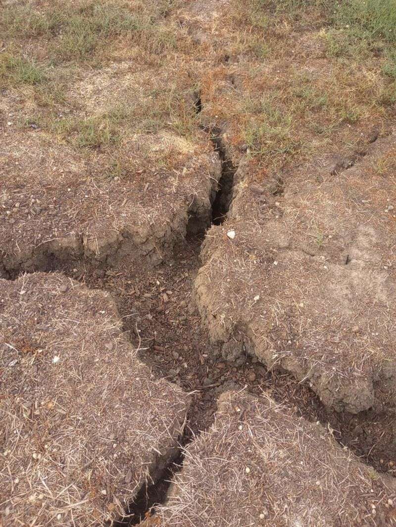 Red Clay Cracks Into Wide Splits Red Clay Cracks Into Wide Splits