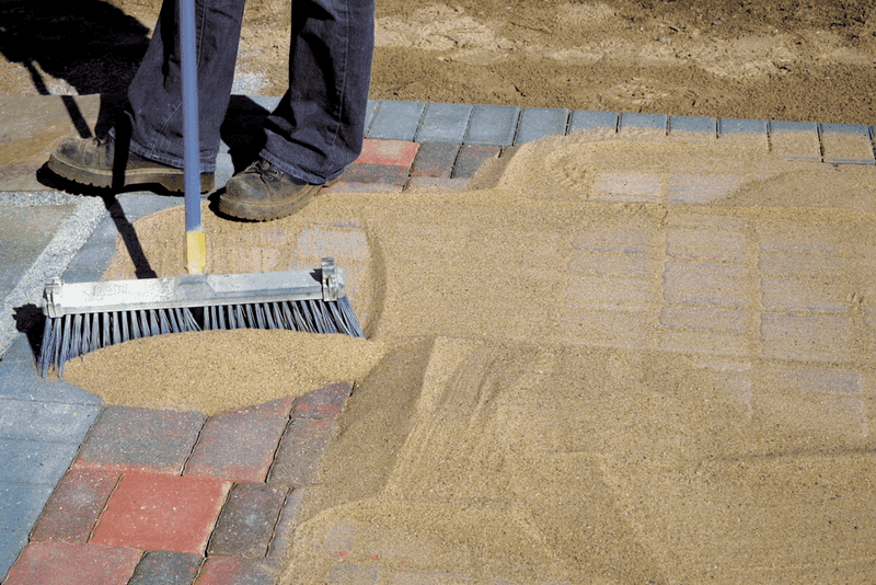 Brush Sand Deep Into Narrow Joints