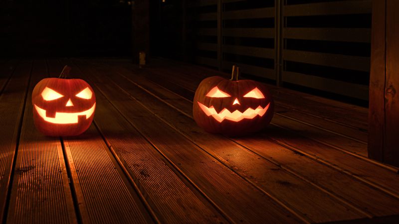 Flameless LED Tea Lights Glow Inside Carved Pumpkins Flameless LED Tea Lights Glow Inside Carved Pumpkins