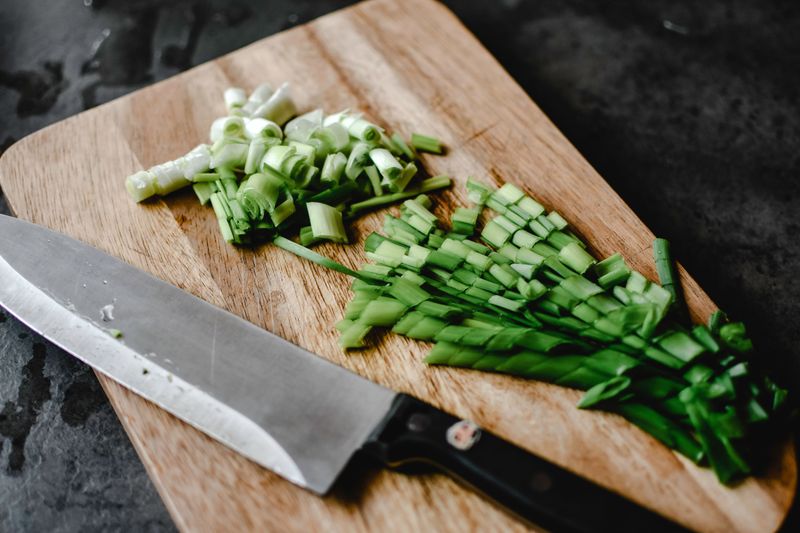 Green Onions From A Small Kitchen Pot