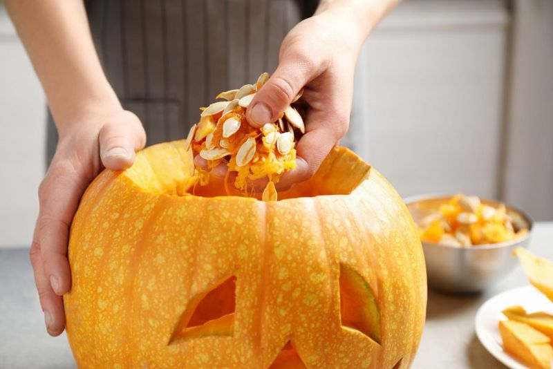 Scoop Jack O Lantern Seeds Right Away